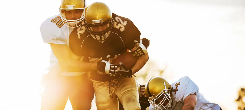 football players in the sun