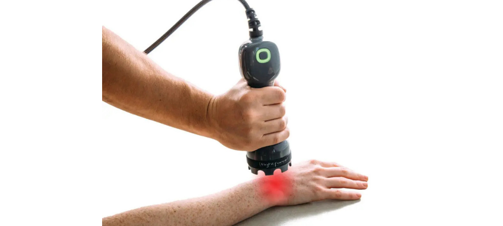 lightforce laser used on patient wrist