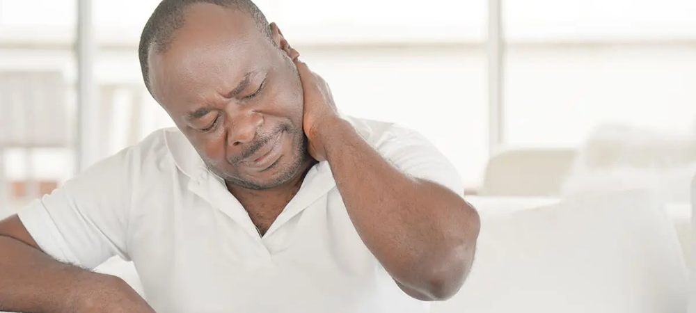 man with neck pain
