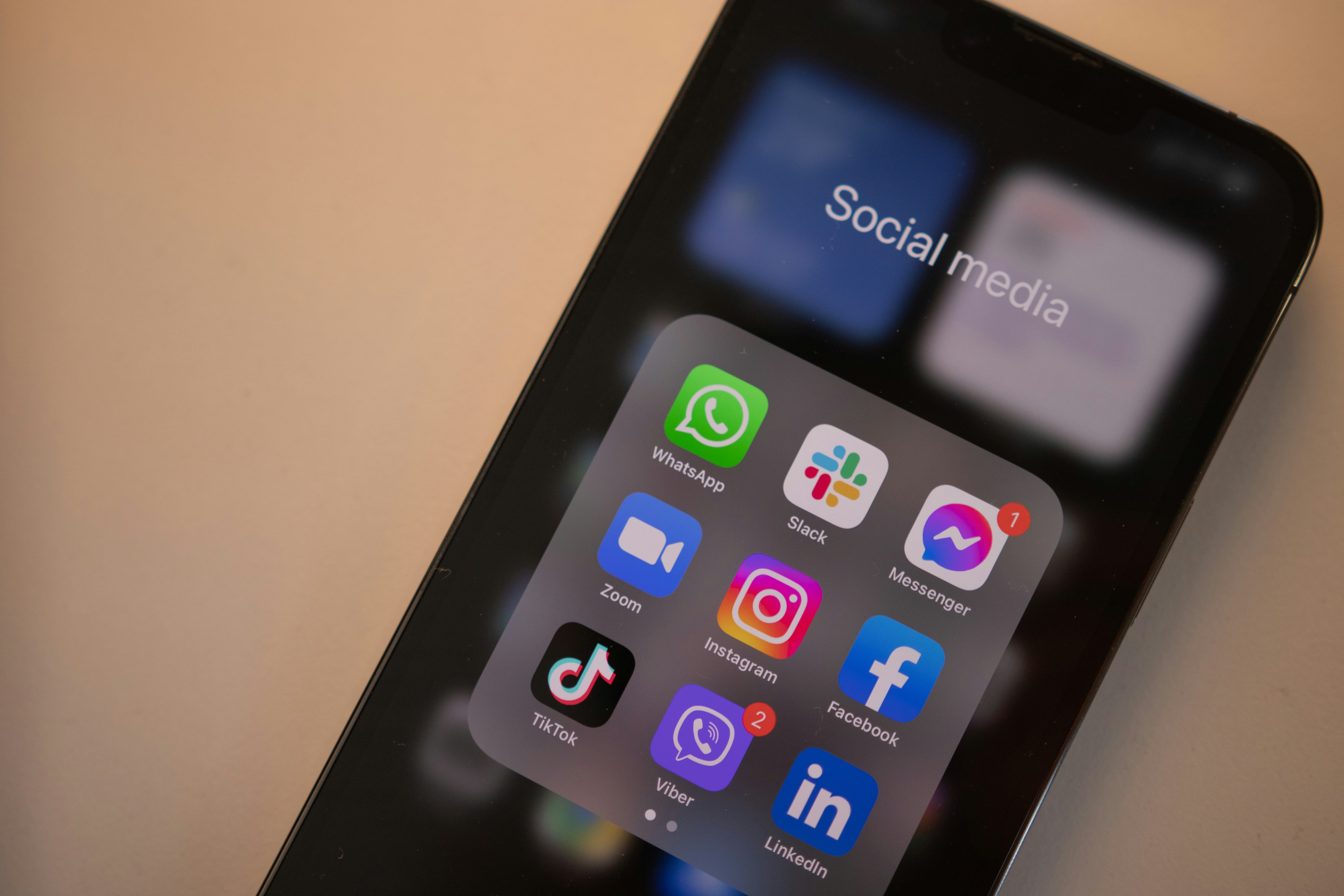 cell phone with social media apps listed