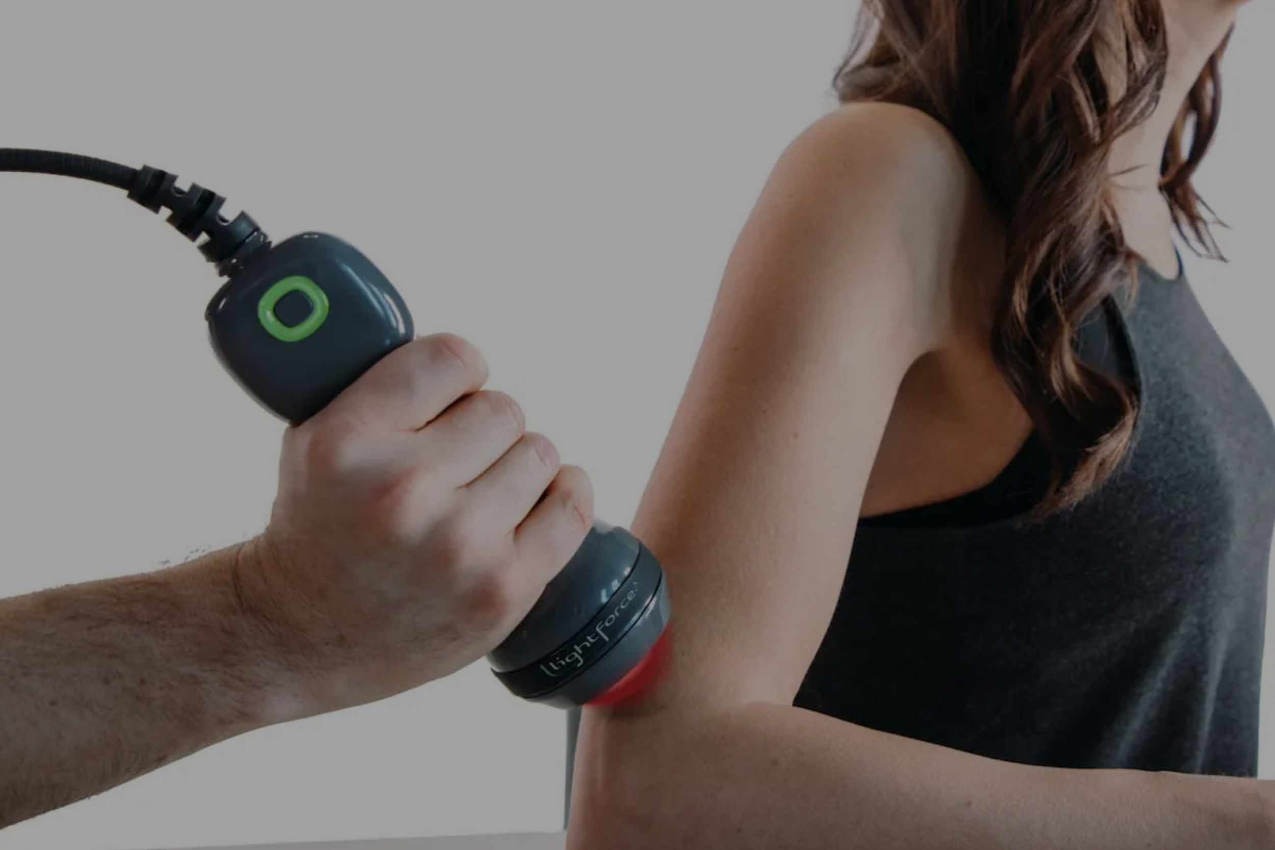 laser on patient elbow
