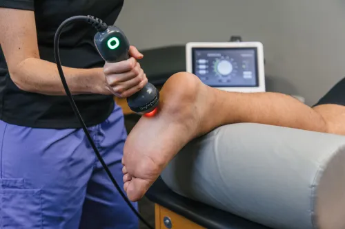lightforce laser used on patient foot